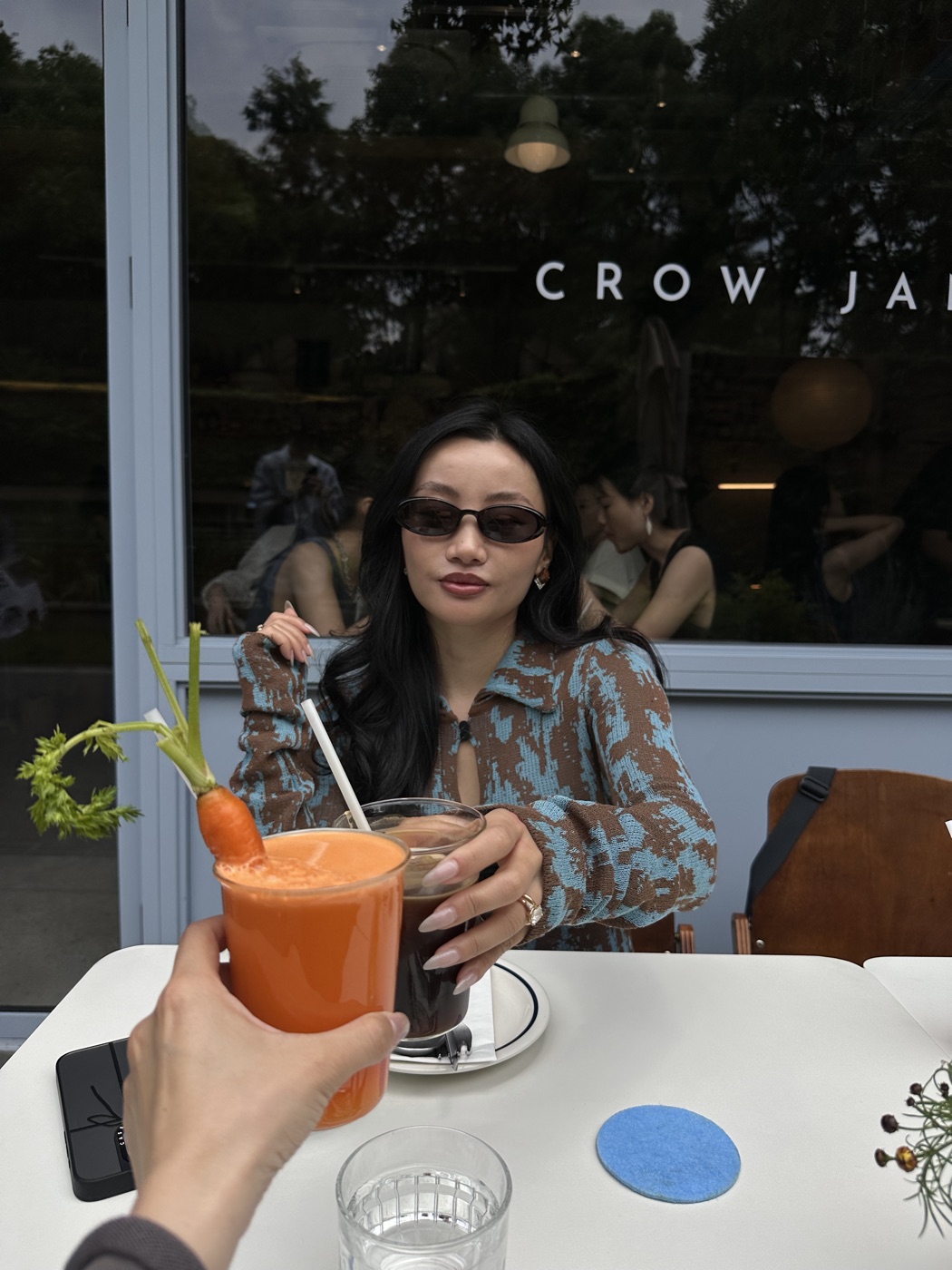 Wendy toasting with a carrot juice
